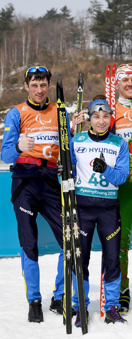 Оксана Шишкова з гайдом Віталієм Козаковим довго йшла до цього «золота». Фото з сайту pyeongchang2018.com